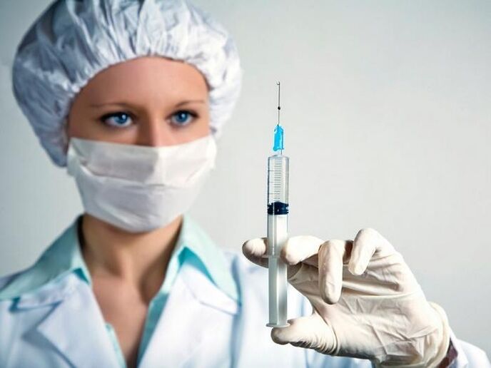 vaccine with syringe and drinking alcohol